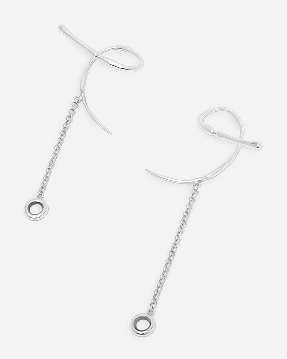 A pair of Echo Earcuffs in polished 925 sterling silver